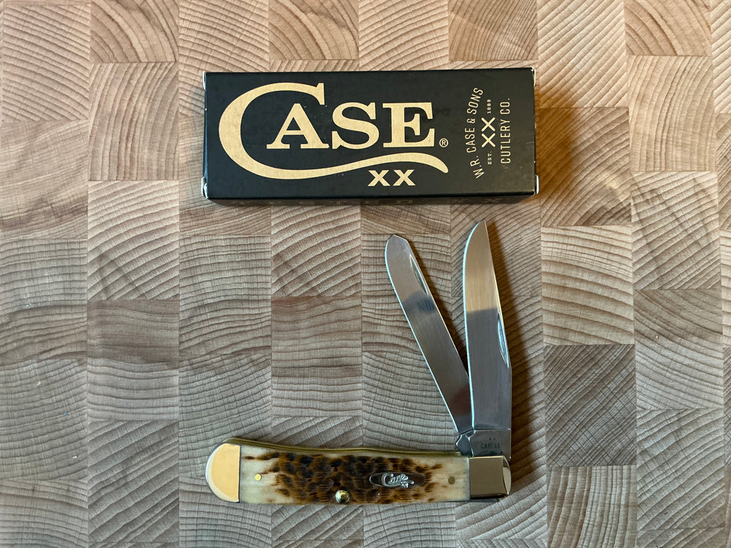 New in box - Amber Bone Peach Seed Jig Trapper