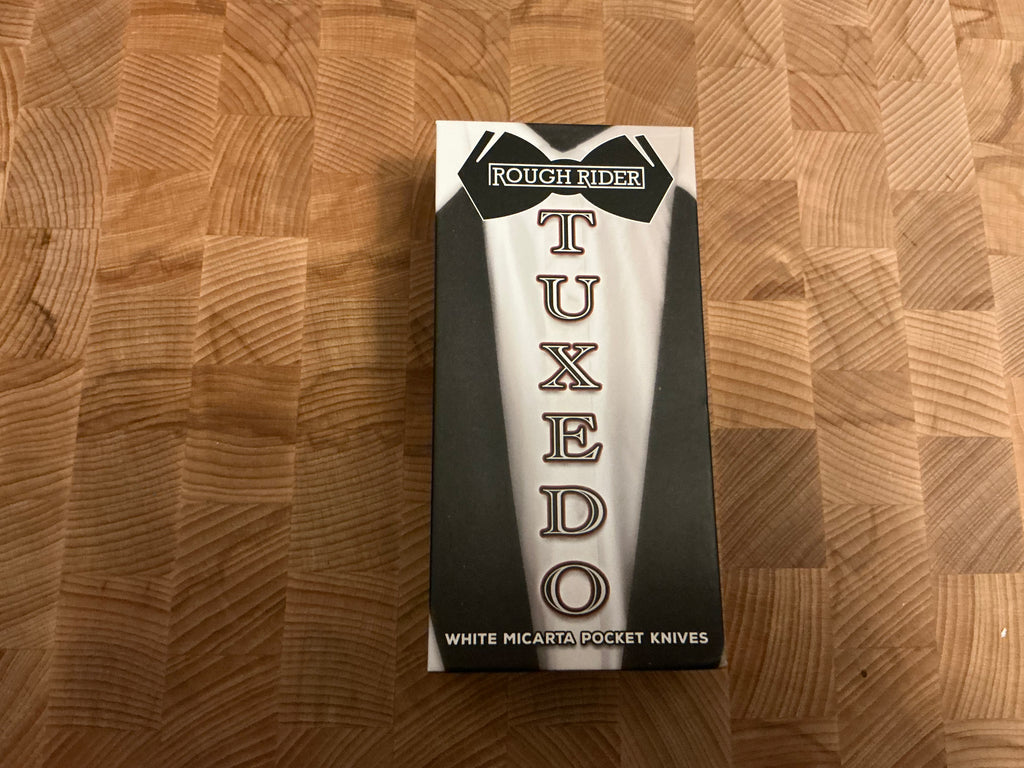 New in box - Tuxedo White Micarta Handle