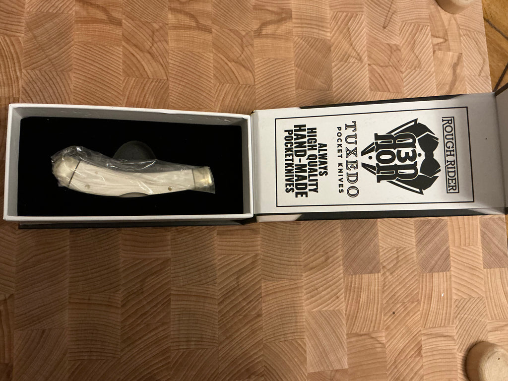 New in box - Tuxedo White Micarta Handle