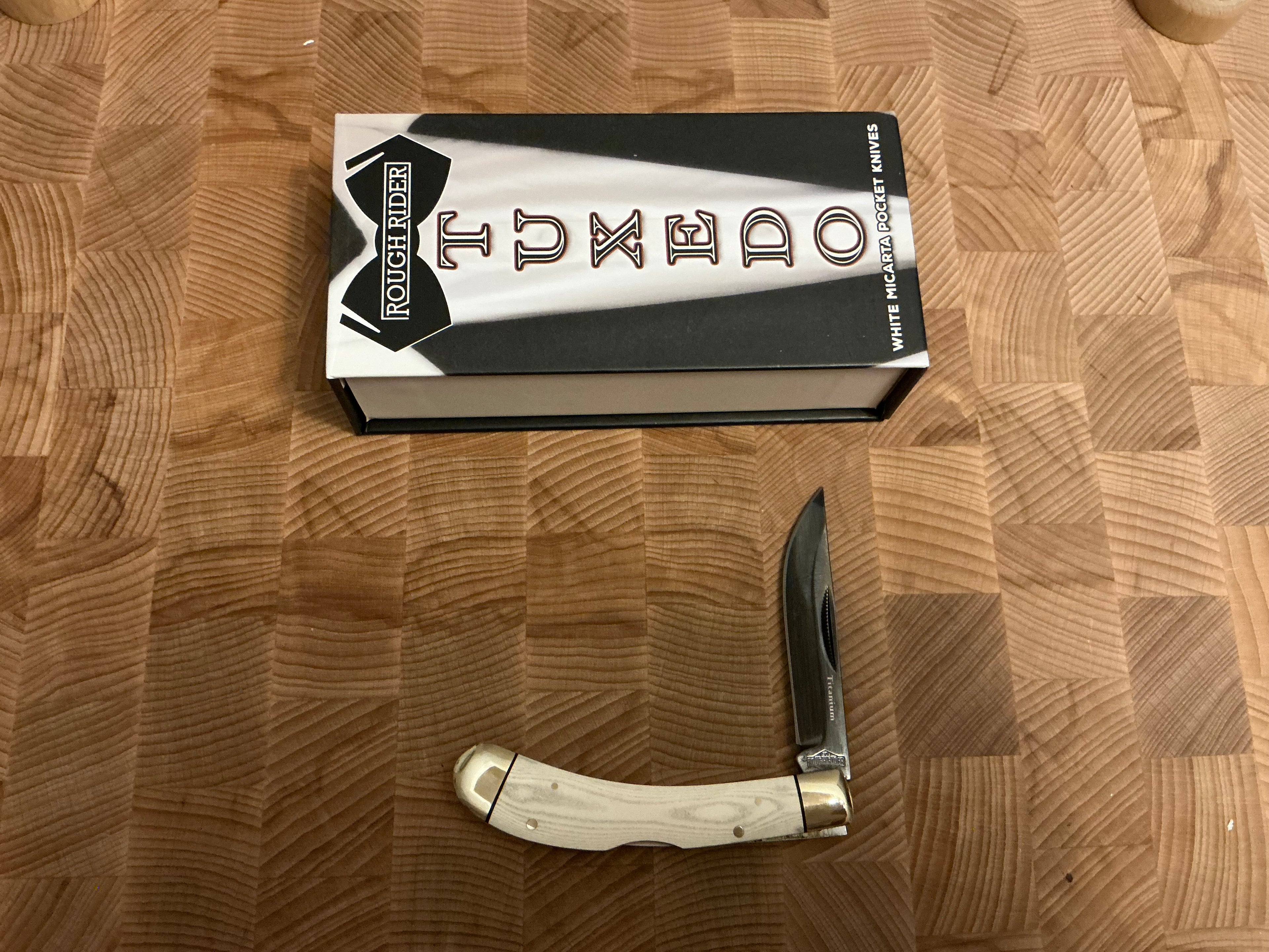 New in box - Tuxedo White Micarta Handle